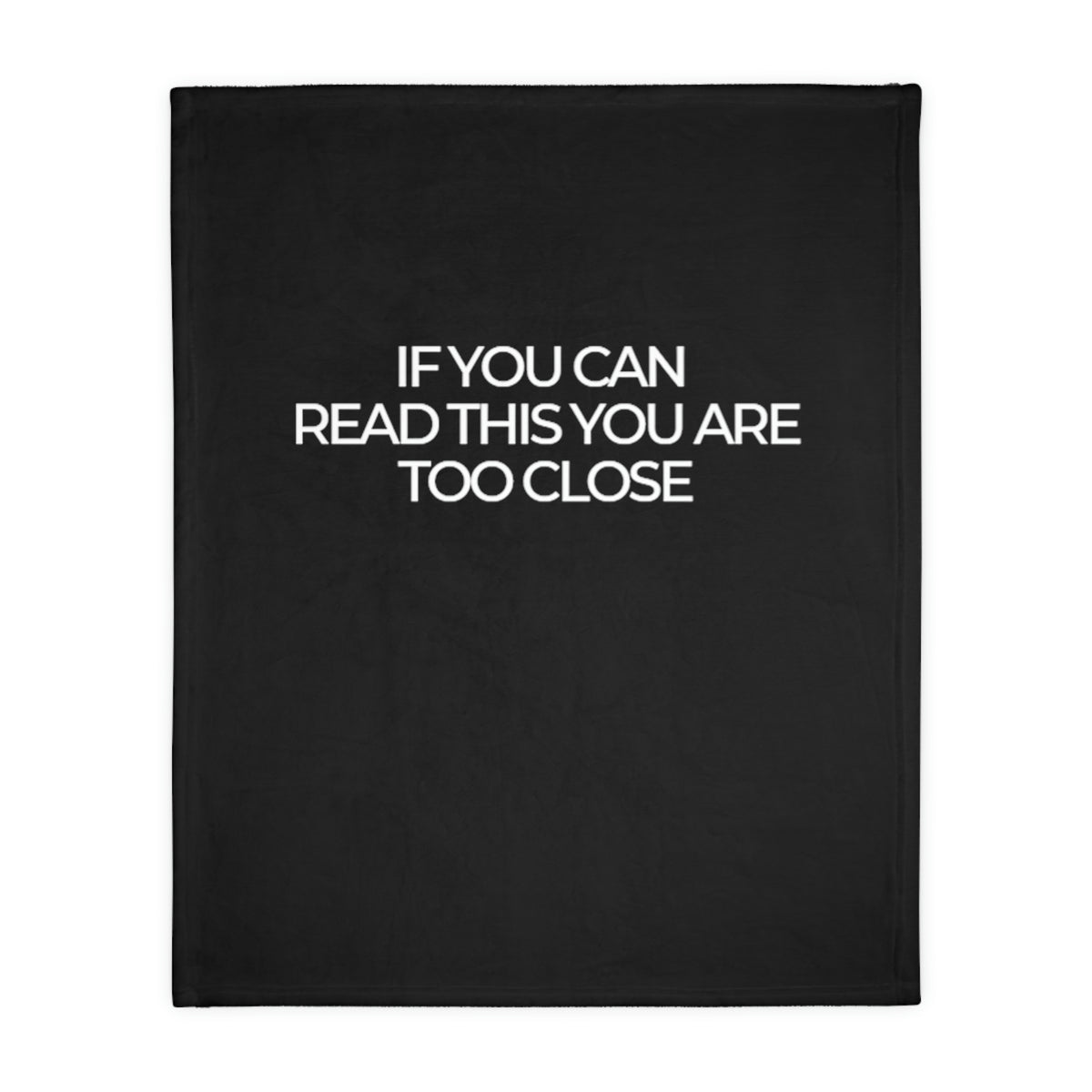 Two-sided printed blanket with "Too close" print