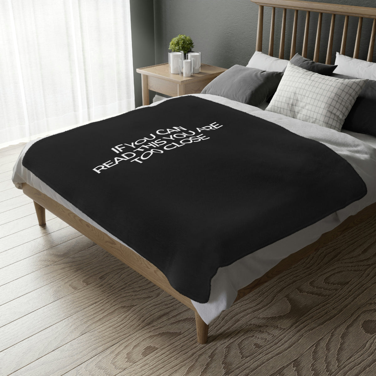 Two-sided printed blanket with "Too close" print