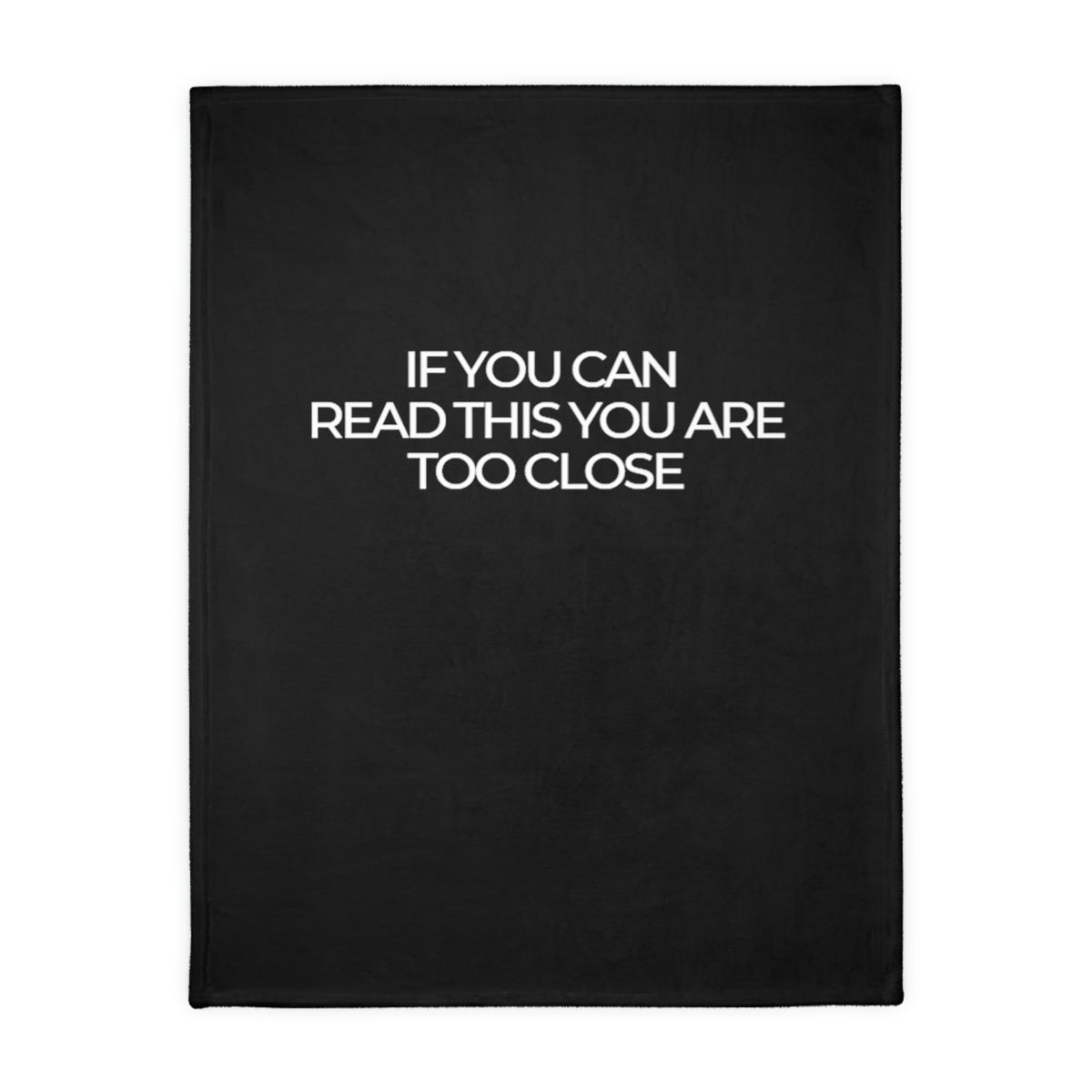 Two-sided printed blanket with "Too close" print